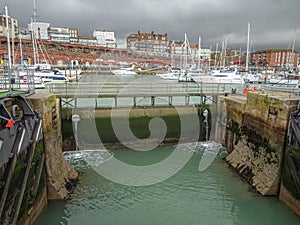 Closed sluice gate leading to the inner basin of Ramsgate Royal Harbour, In Kent, UK