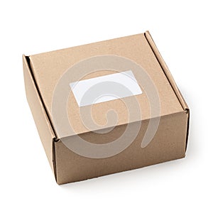 Closed square shaped cardboard box isolated on white background