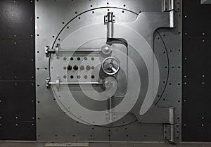 Closed steel bank vault door, close-up. Bank vault