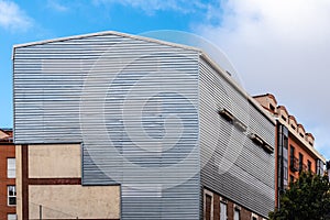 The closed steel facade of a building during restoration works