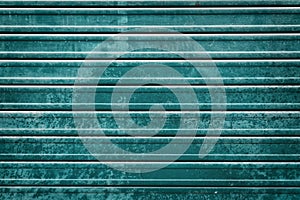 Closed teal roller door background