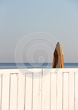 Closed umbrella of a bathing establishment