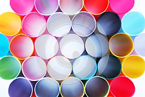 Closed up colorful plastic straws white background