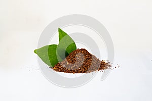 Closed up Heap of Ground Coffee on white background. Extract coffee beans to powder for make any beverage of coffee.