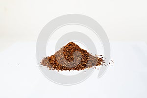 Closed up Heap of Ground Coffee on white background. Extract coffee beans to powder for make any beverage of coffee. Beans.