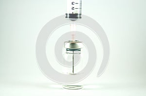 Closed up needle put in vial