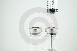 Closed up needle put in vial