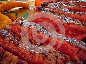 Closed up of sliced medium rare beef steak. Barbecue steak Rib eye. Traditional American style food