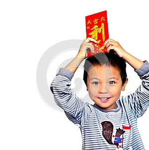 Closed up Smiling asian child is holding red packets and Chinese word all meaning profit, isoleted on white backgrond,