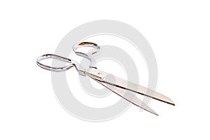 Closed up steel scissors on white background