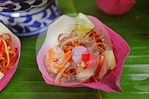 Closed Up Thai Style Fresh Lotus Flower Petal Wrapped Appetizer Called Miang kham
