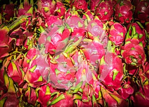 Closed up Vivid and Vibrant Dragon Fruit against for sale in a local food market