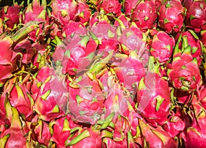 Closed up Vivid and Vibrant Dragon Fruit against for sale in a local food market