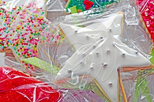 Closed-up White Colour Candy Coated Star Shaped Christmas Gingerbread.