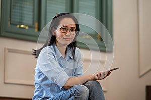 Closed up of young Asian woman smile portrait.