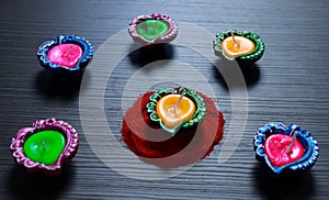 A closed view of Diyas. Diyas arranged in diffrent ways for celebrating Diwali