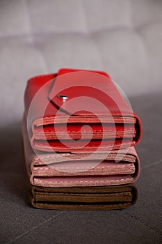 Closed Wallets. Multi-colored leather. Pink, red, brown