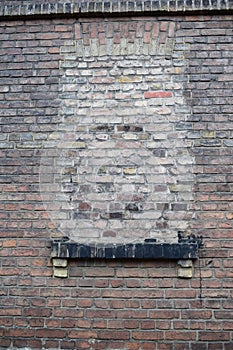 closed window with bricks