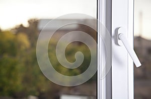 Closed window with handle. PVC plastic
