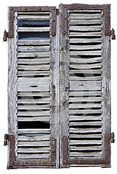 Closed window with old wood shutters