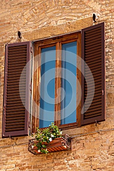 Closed Window With Open Shutter