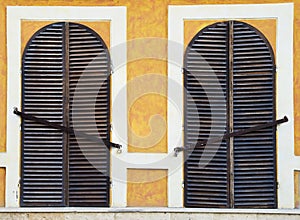 Closed windows with grates