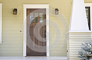 Closed wooden door of a home