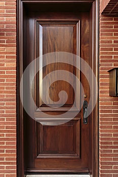 Closed Wooden Front Door of a Luxury Home
