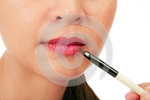 Closedup on the lips of an asian middle age woman photo