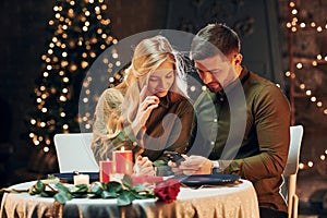 Closeness of the people. Young lovely couple have romantic dinner indoors together