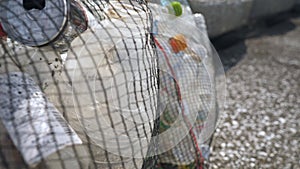 Closer look of the black net bag in Koijigahama Beach in Tahara Japan