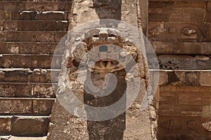 Closer look on one of the snake heads attached to the Temple of the Feathered Serpent Templo de QuetzalcoÂ³atl, photo