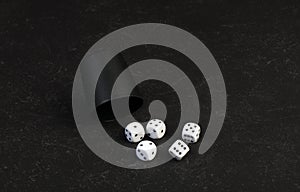 Closeup of 5 dice used gambling on a table