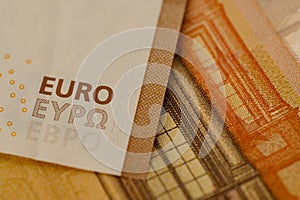 closeup 50 euro banknotes of european union, concept of savings, banking, tax payment, economic cooperation, actual problems of