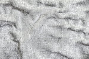 Closeup abstract pattern at wrinkled gray women`s clothing textured background