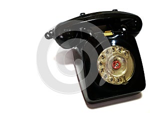 A vintage and antique telephone with white background. photo