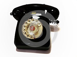 A vintage and antique telephone with white background. photo