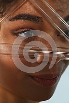 Closeup of african-american female face with clean healthy skin. Skincare and beauty concept