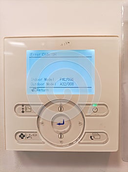 Closeup of Air Conditioner remote control electric panel