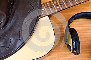 Closeup American Country music background with guitar and cowboy hat