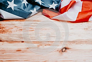 Closeup of American flag on wood background