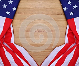 Closeup of American flag on wood background