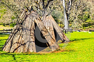 Closeup Of American Indian Tepees & Lodging