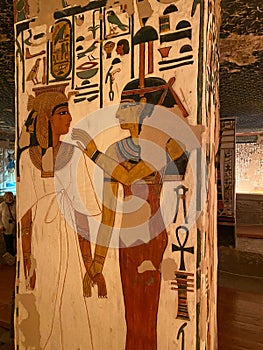 Closeup of ancient Egyptian frescos on the walls in a temple in Luxor, Egypt