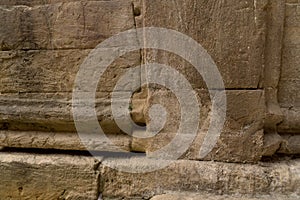 Closeup ancient Roman brick wall column cornice