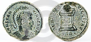 Closeup of an ancient Roman copper coin of Emperor Constantine I Magnus.