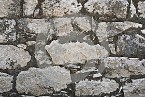 Closeup of ancient stone wall texture of Mayan Coba Ruins, Mexico