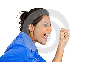 Closeup of an angry woman screaming being hysterical