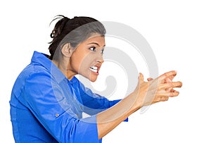 Closeup of an angry woman screaming being hysterical