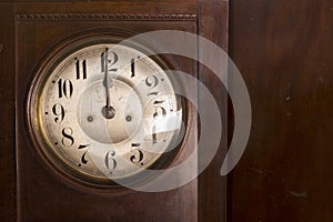 Closeup of an antique pendulum clock